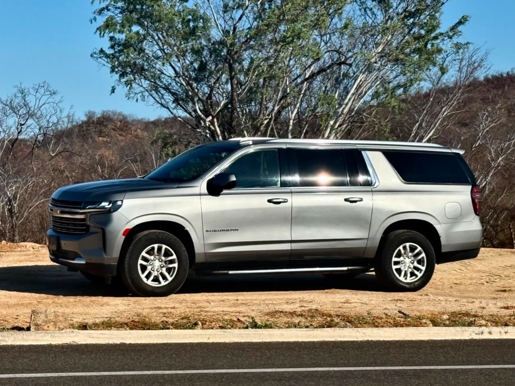 Silver Chevrolet Suburban, side profile